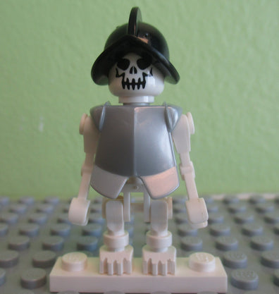 LEGO Minifigure-Skeleton, Fantasy Era Torso with Evil Skull, Black Conquistador Helmet, Pearl Light Gray Armor-(Other)-GEN021-Creative Brick Builders
